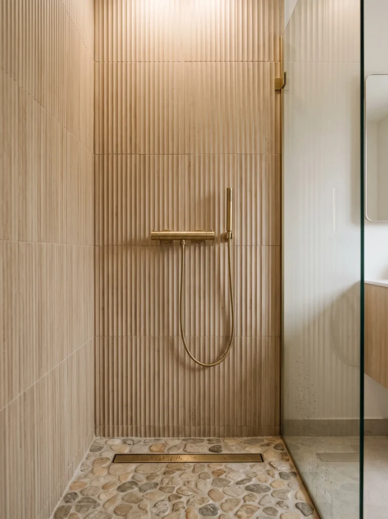 vertical ribbed matte ceramic tile on a Japandi shower wall