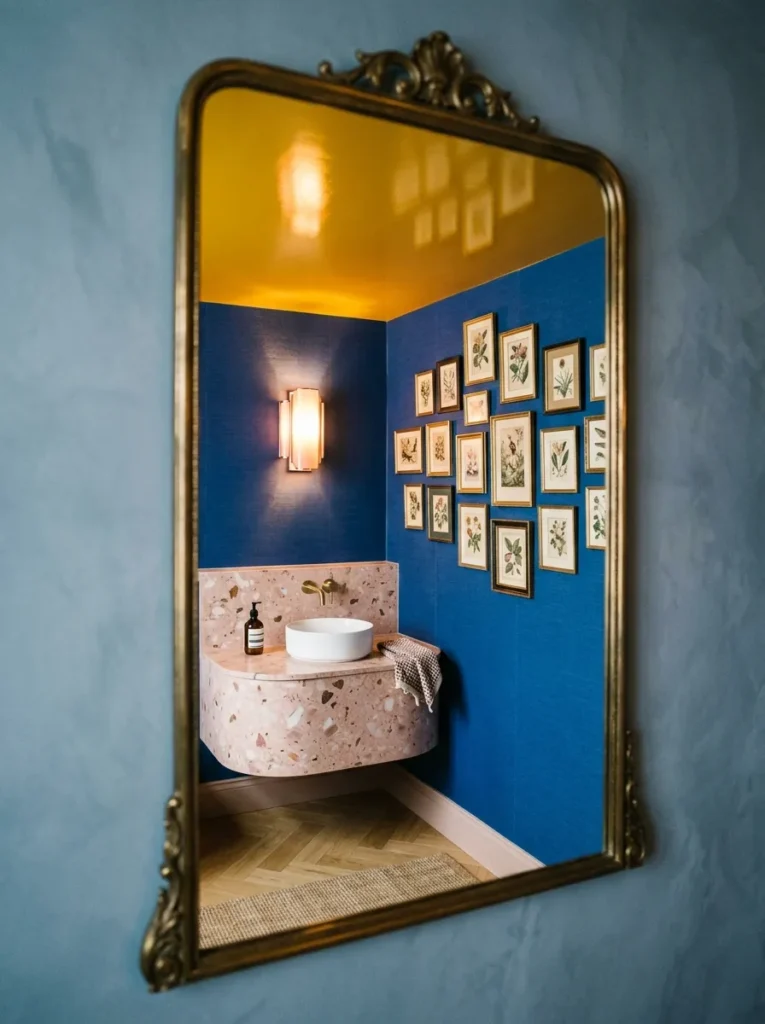 "Maximalist powder room with cobalt wallpaper and saffron ceiling"